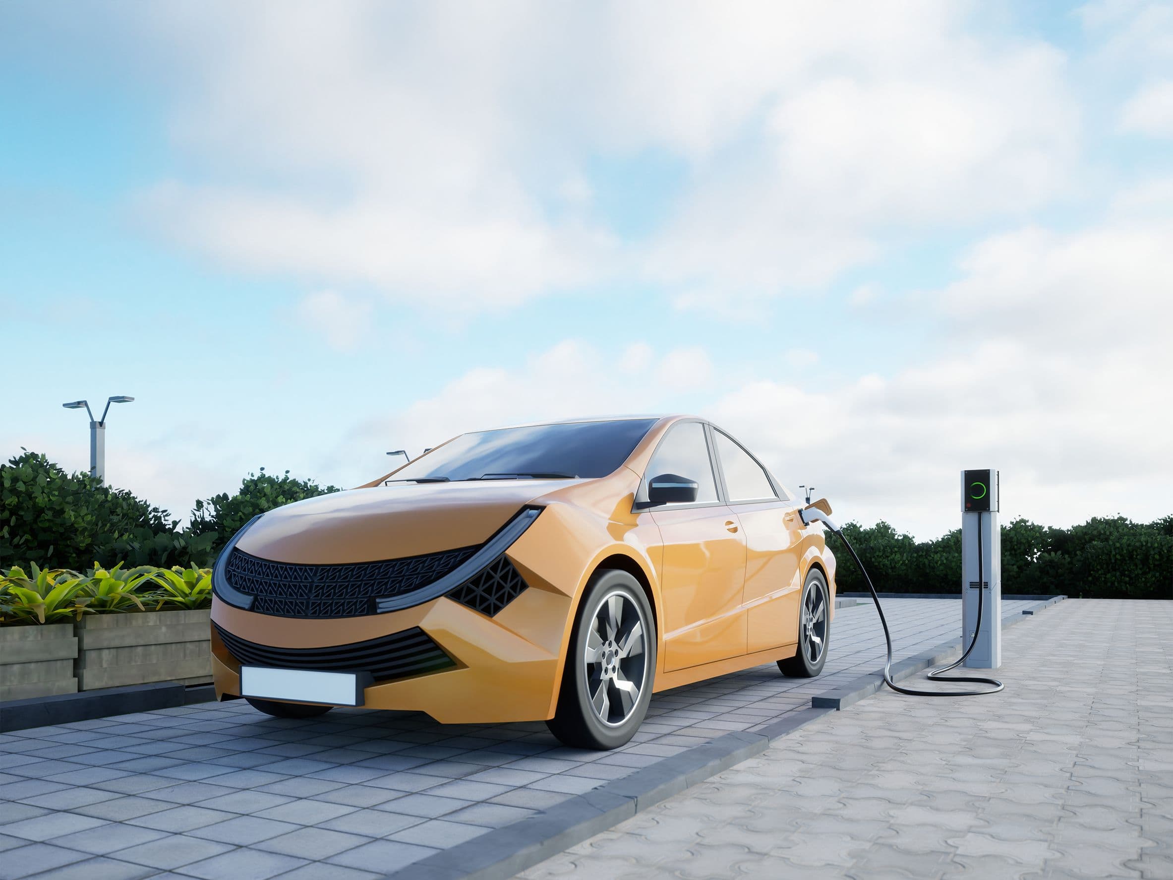 Une voiture électrique jaune garée en train de se recharger